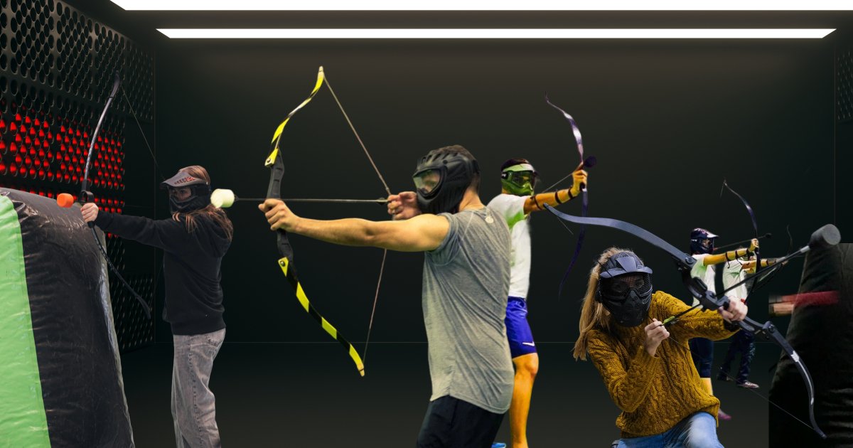 A group of players battling it out in the Archery Tag arena