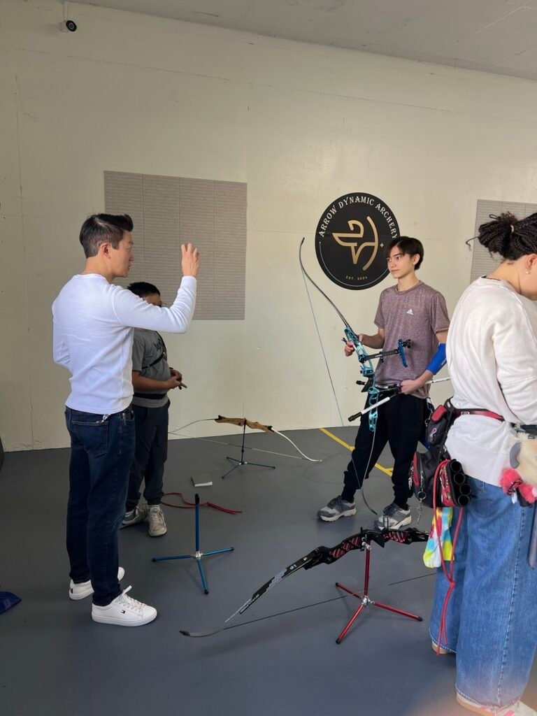 coach and students in a class