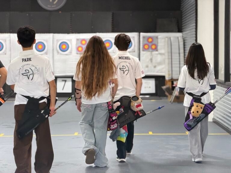 Kids walking to the archery target